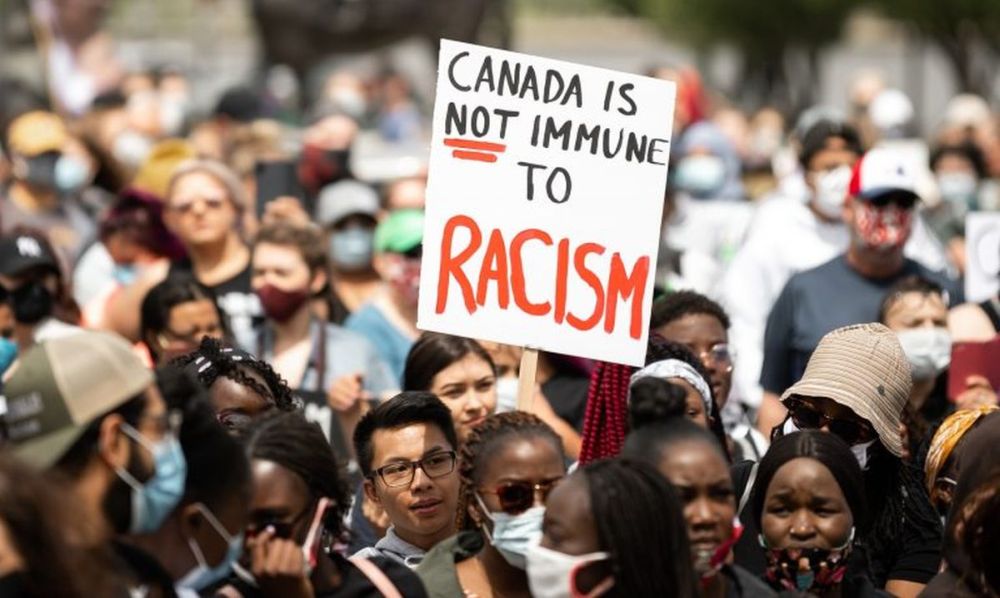 Does racial discrimination in Canada affect immigrants